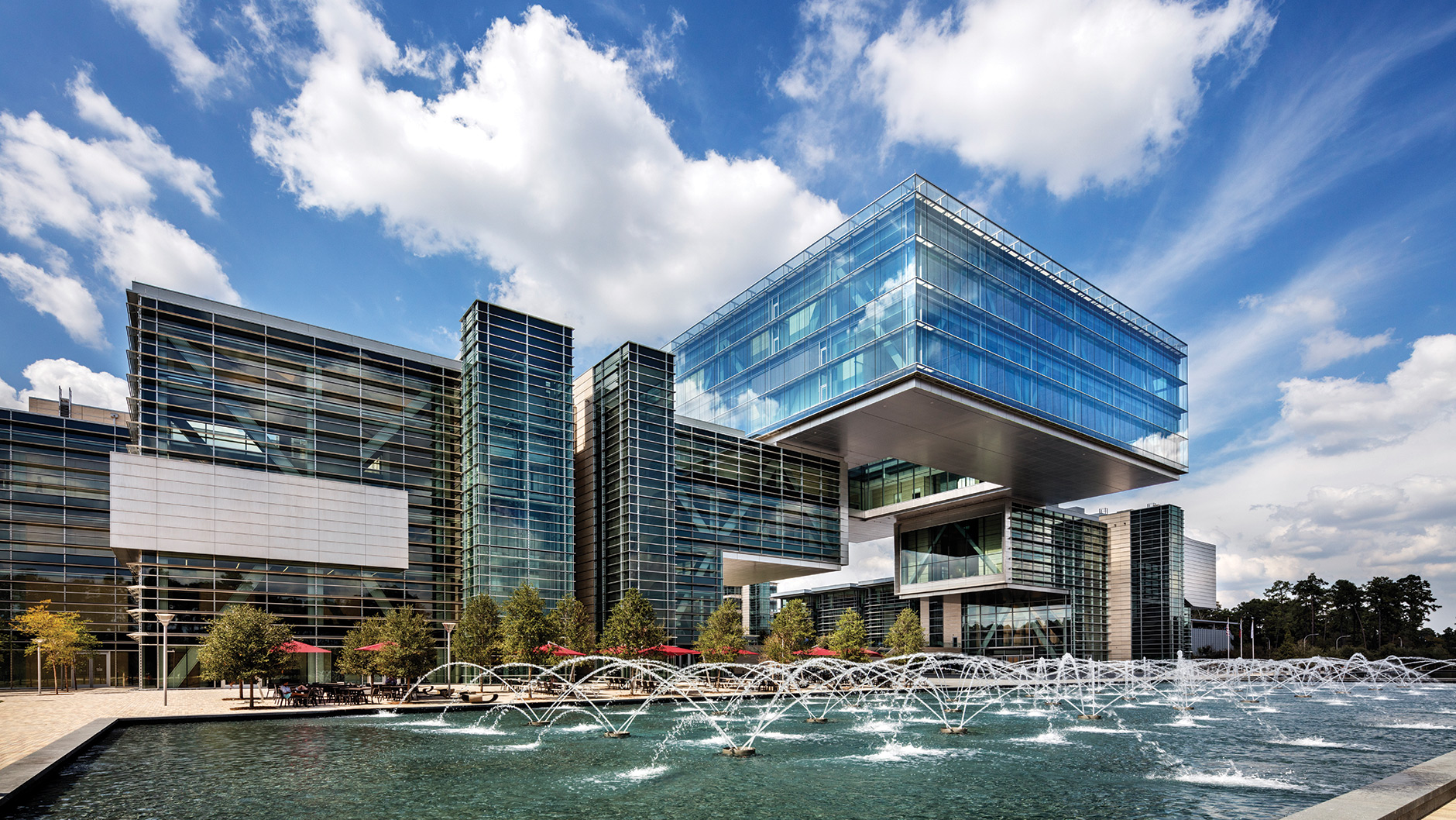 Exterior photo of the houston campus energy center and fountains.