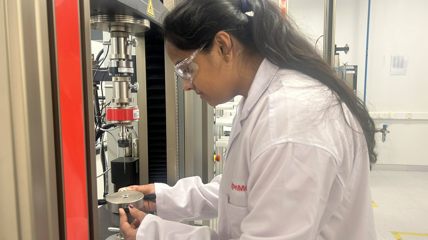 Bengaluru Research and Development Technology Centre female employee working on equipment