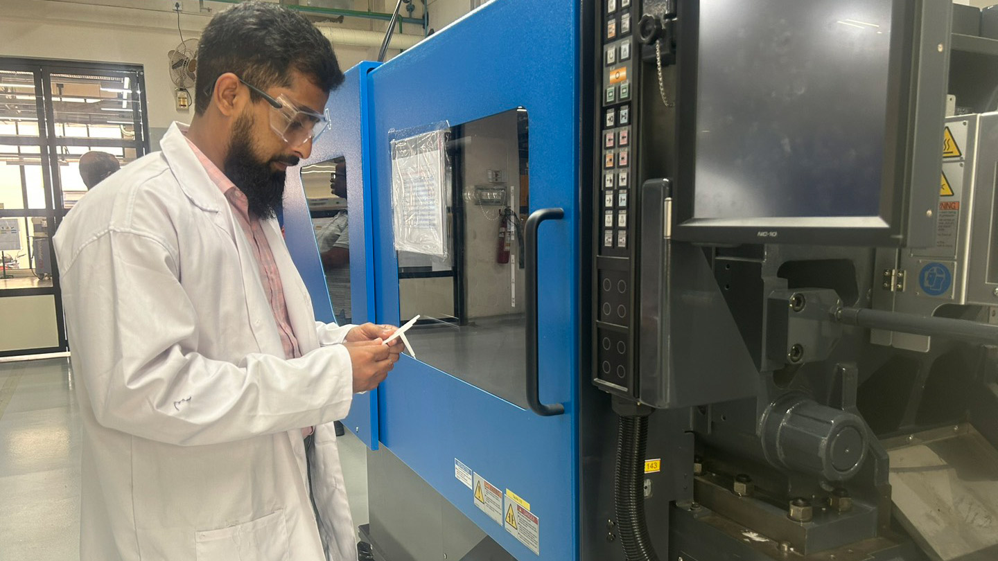 Bengaluru Research and Development Technology Centre male employee working on equipment